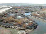 Brush smolders near South Cottonwood Creek