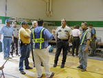 Officials discuss the drill.