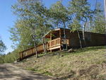 One of the log cabins available for rent at Half Moon Lake Resort