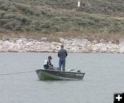 Fishing from their boat. Photo by Pinedale Online.
