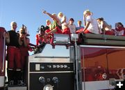 Loading onto the firetrucks. Photo by Pinedale Online.