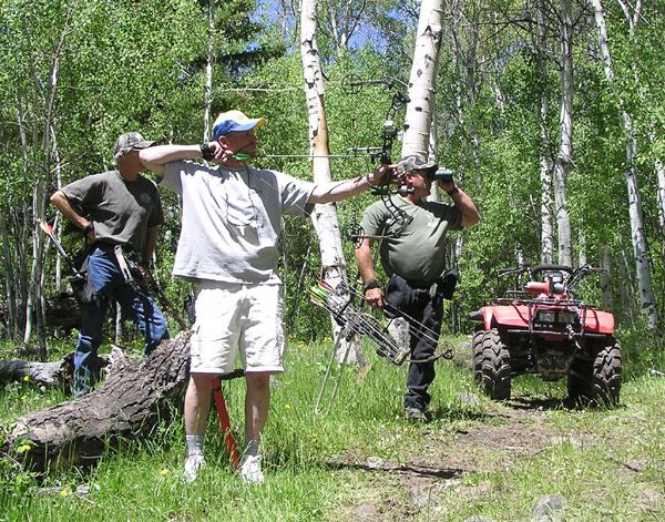 Aiming for an elk. Photo by Pinedale Online.