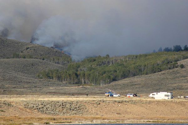 Helicopter and fire crew. Photo by Clint Gilchrist, Pinedale Online.