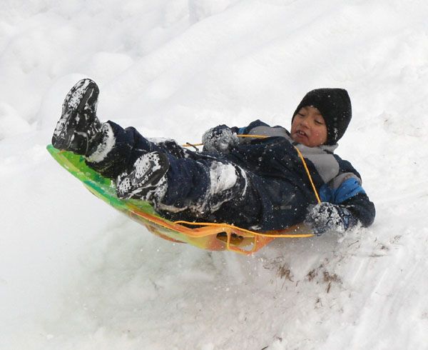 Sledding Fun. Photo by Clint Gilchrist, Pinedale Online.
