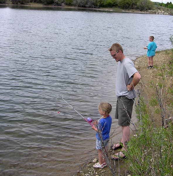 Fishing with Dad. Photo by Dawn Ballou, Pinedale Online.