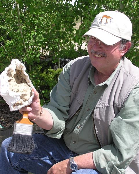 Sam Drucker with bison bones. Photo by Dawn Ballou, Pinedale Online.