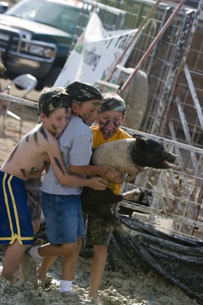 Pig Hunters. Photo by Tara Bolgiano, Blushing Crow Photography.