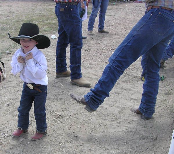 Roped Dad's foot. Photo by Dawn Ballou, Pinedale Online.