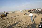 Ground cowboys run out. Photo by Tara Bolgiano, Blushing Crow Photography.