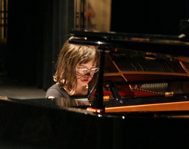 Brenna Neal on the piano. Photo by Pam McCulloch, Pinedale Online.