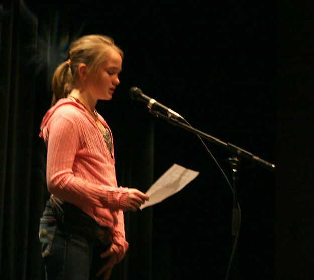 Reading a poem. Photo by Pam McCulloch, Pinedale Online.