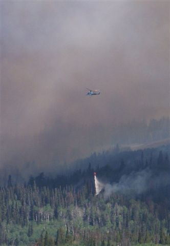 Helicopter bucket drop. Photo by Allene Dana.