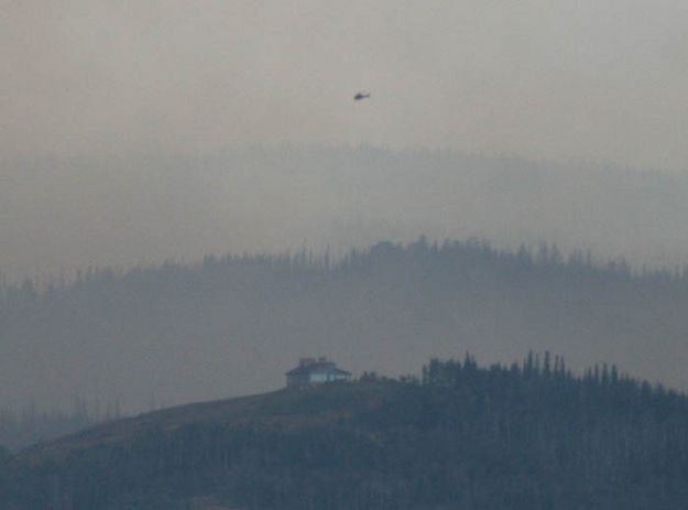 Helicopters over the home. Photo by Dawn Ballou, Pinedale Online.