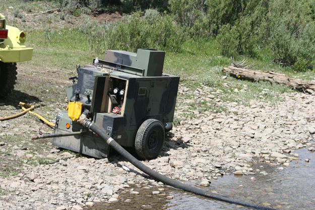 Pump in stream. Photo by Dawn Ballou, Pinedale Online.