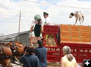 Handing it down. Photo by Dawn Ballou, Pinedale Online.