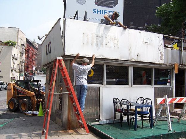 Taking down front. Photo by John Moore.