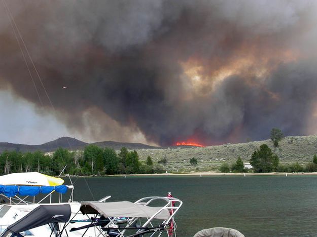 Flames and smoke approach. Photo by Jesse Lake, Lakeside Lodge.