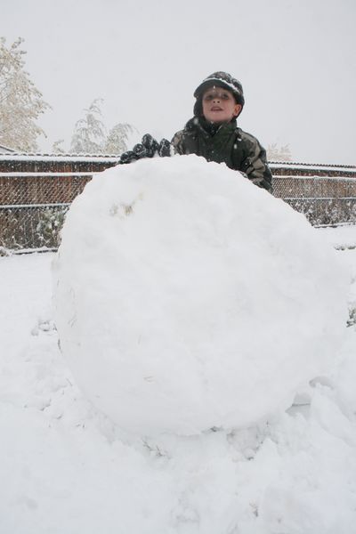 Building a snowman. Photo by Pam McCulloch.