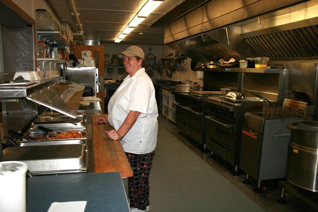 Dourthea in the kitchen. Photo by Dawn Ballou, Pinedale Online.