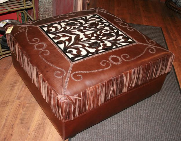Leather foot stool. Photo by Dawn Ballou, Pinedale Online.
