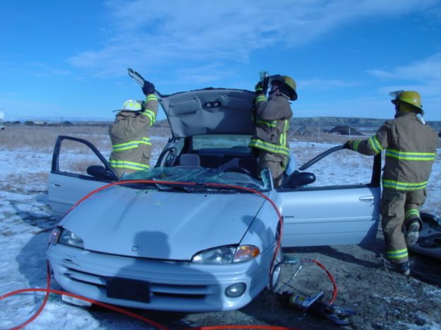 Taking off the roof. Photo by Sublette County Fire Board.