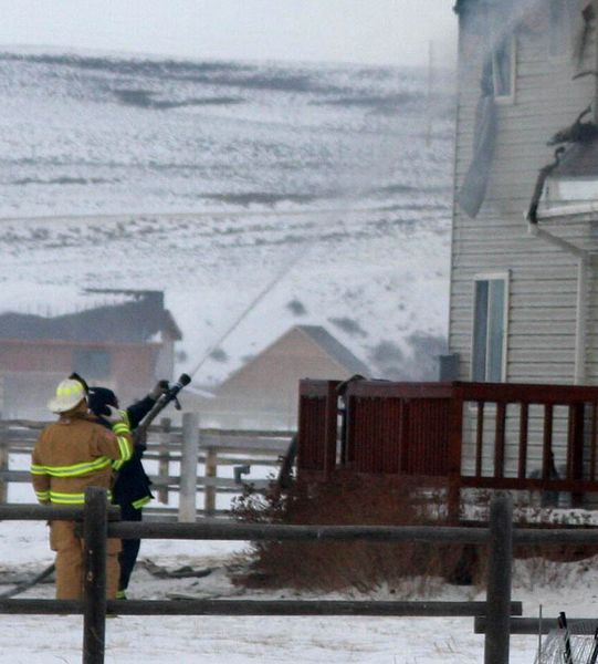 Spraying Water. Photo by Clint Gilchrist, Pinedale Online.