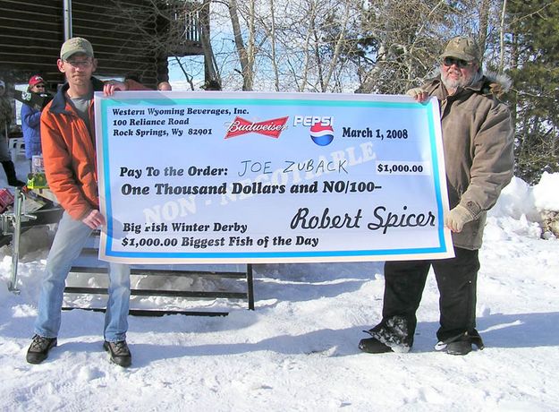 Joe Zuback $1000 check. Photo by Bill Boender.