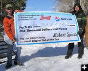 Robyn Williams $1000 check. Photo by Bill Boender.