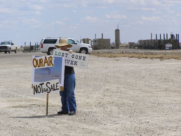 Arranging signs. Photo by Sue Sommers.