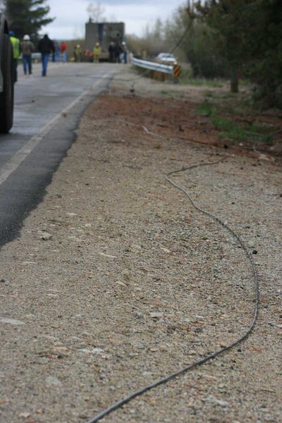 Downed lines on road. Photo by Dawn Ballou, Pinedale Online.