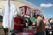 Selling t-shirts. Photo by Dawn Ballou, Pinedale Online.