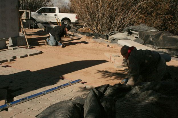 Smoothing for bricks. Photo by Dawn Ballou, Pinedale Online.