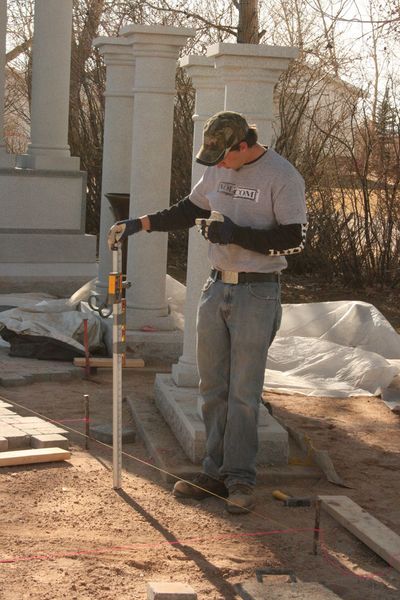 Measuring for bricks. Photo by Dawn Ballou, Pinedale Online.