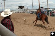 Out the chute. Photo by Dawn Ballou, Pinedale Online.