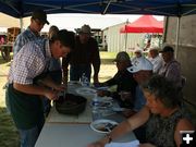 Dutch Oven Cooking judging. Photo by Dawn Ballou, Pinedale Online.