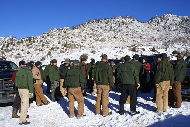 Debriefing. Photo by Cat Urbigkit, Pinedale Online.