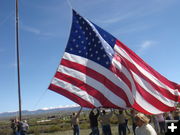 Raising the flag. Photo by Windy Noble.