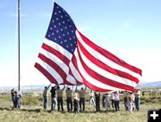 Raising Old Glory. Photo by Mari Muzzi, Sublette Examiner.