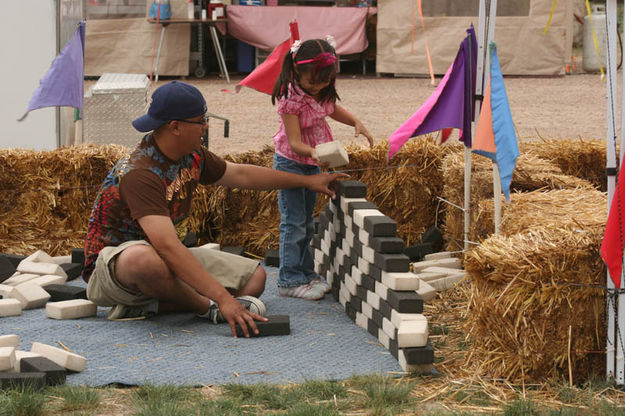 Stacking Bricks. Photo by Dawn Ballou, Pinedale Online.