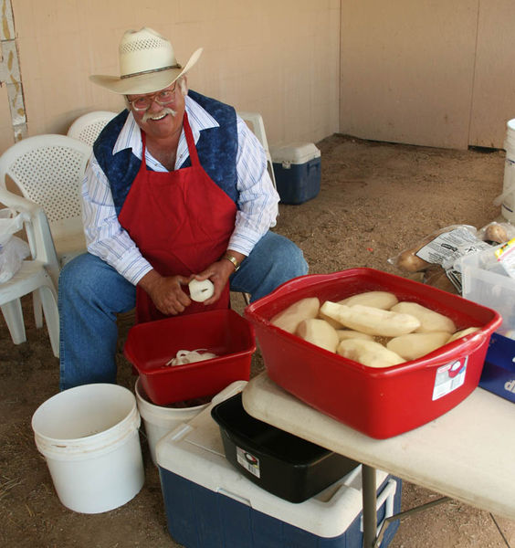 Cutting potatoes. Photo by Dawn Ballou, Pinedale Online.