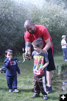 Reeling It In. Photo by Pam McCulloch, Pinedale Online.