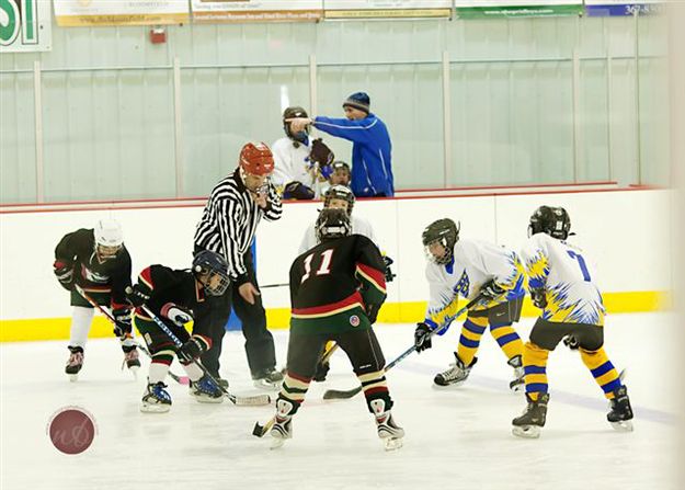 Face off with Park County Ice Cats. Photo by Natalie Bacon.