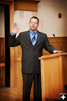 Neal Stelting takes his oath. Photo by Tara Bolgiano.