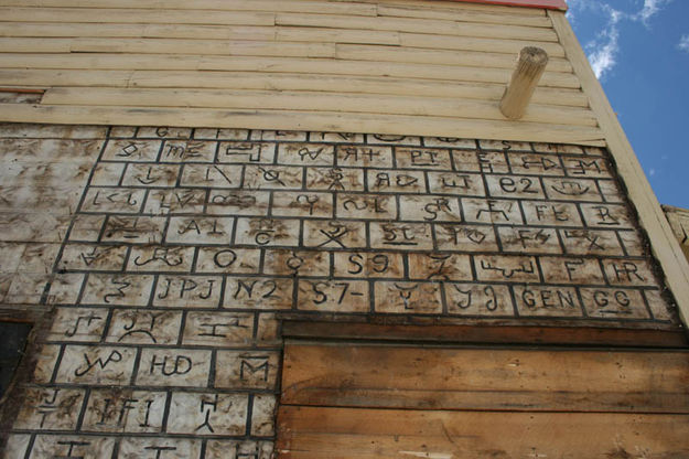 Brands on east wall. Photo by Dawn Ballou, Pinedale Online.