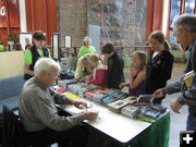 Book Signing. Photo by Bill Winney.