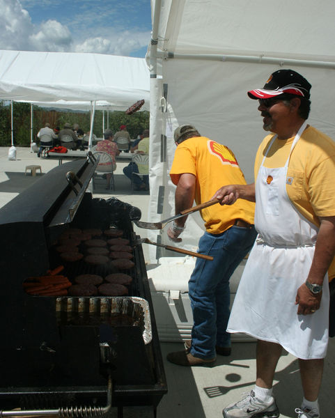 Burger flip. Photo by Dawn Ballou, Pinedale Online.