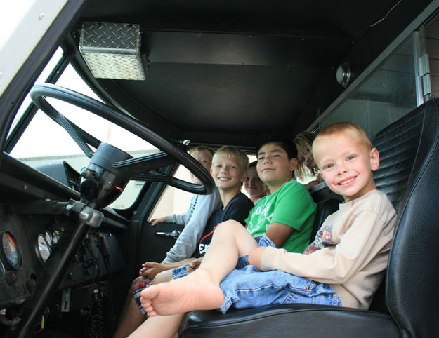 Kids in the cab. Photo by Dawn Ballou, Pinedale Online.