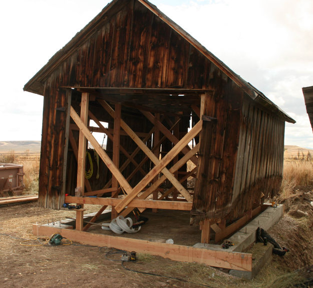 Restoring the garage. Photo by Dawn Ballou, Pinedale Online.