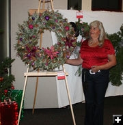 Julie Early and her wreath. Photo by Dawn Ballou, Pinedale Online.