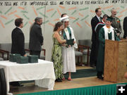 Christina Silvey gets her diploma. Photo by Bob Rule, KPIN 101.1 FM Radio.